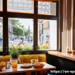 스페인 카페 문화와 음료 - **Prompt:** A vibrant, sun-drenched Spanish caf&eacute; during the morning rush. The scene captures the liv...